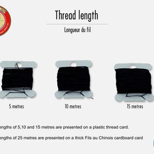 May include: Three white plastic thread cards wrapped with black thread, labeled 5 metres, 10 metres, and 15 metres. Text reads: Thread length, Longueur du fil, Lengths of 5, 10 and 15 metres are presented on a plastic thread card, Lengths of 25 metres are presented on a thick Fils au Chinois cardboard card.