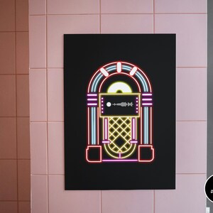 May include: A digital download of a neon sign illustration of a vintage jukebox with a Spotify logo on the screen. The jukebox is outlined in pink, blue, and yellow neon.
