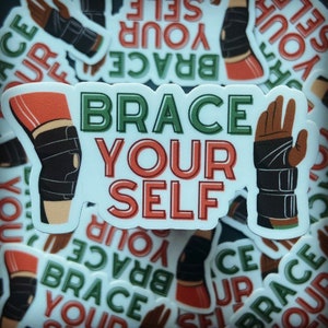 May include: A sticker with the text "BRACE YOUR SELF" in green, red, and white. The sticker features a cartoon illustration of a knee brace and a wrist brace.