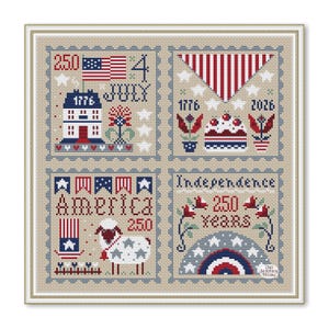 May include: A cross-stitch sampler with a patriotic theme, featuring red, white, and blue designs. The sampler includes images of the American flag, a house, a cake, and a sheep, along with the words "4 July," "America," and "Independence 250 Years."