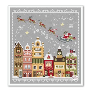 Patrón de punto de cruz "Santa sobre la ciudad": Muestrario navideño (patrón PDF)