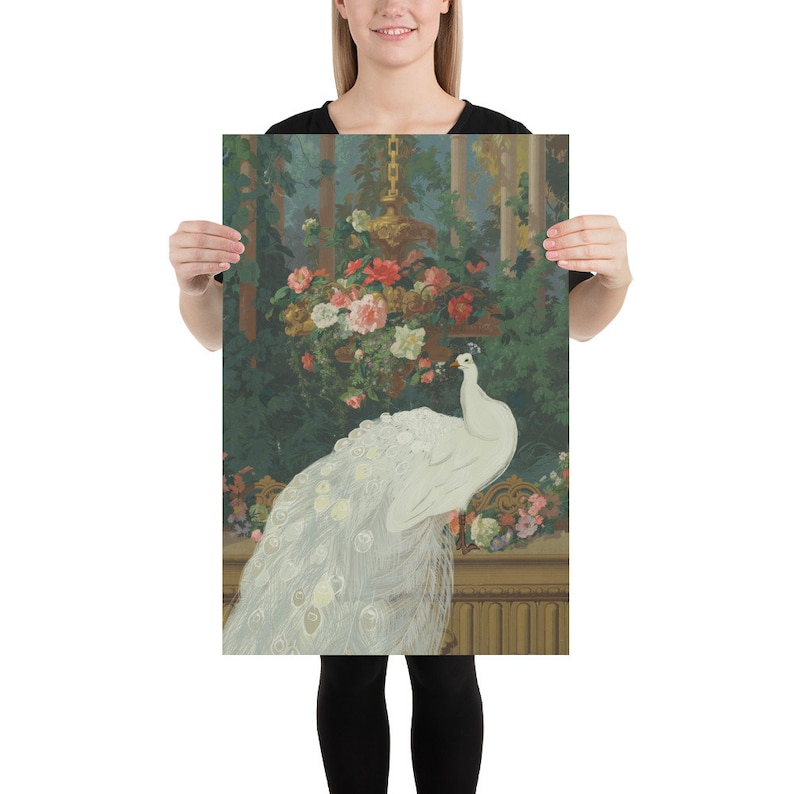 May include: A framed print featuring a white peacock with a long, flowing tail. The peacock is perched near a decorative ledge with a floral arrangement. The background includes lush greenery and a hanging floral display, creating a vintage aesthetic.