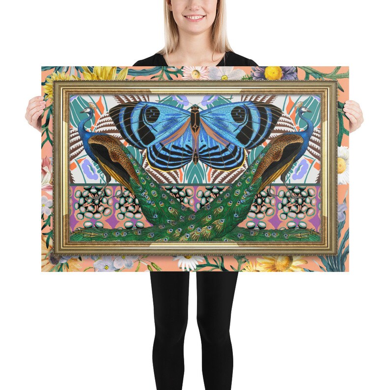 May include: A framed print featuring a blue butterfly with black stripes and two peacocks with green and blue tail feathers. The background is a colorful pattern of flowers, leaves, and geometric shapes.