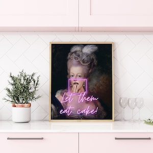 May include: A framed print of a portrait of a woman in a white dress and a large white wig. The woman is holding her finger to her lips and the text "Let them eat cake!" is written below the portrait.