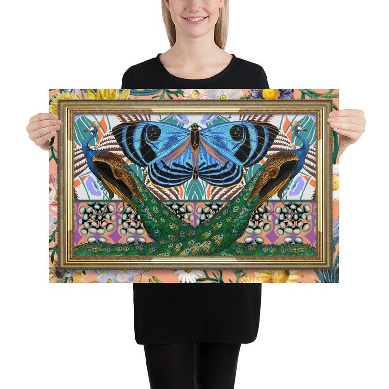 May include: A framed print featuring a blue butterfly with black and white markings, centered between two peacocks with green and blue plumage. The background is a colorful pattern of flowers, leaves, and geometric shapes.
