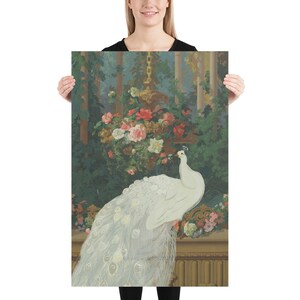 May include: A framed print featuring a white peacock with a long, flowing tail. The artwork depicts the bird in a garden setting with lush greenery, flowers, and a decorative gold-toned structure. The color palette includes soft greens, pinks, and whites.