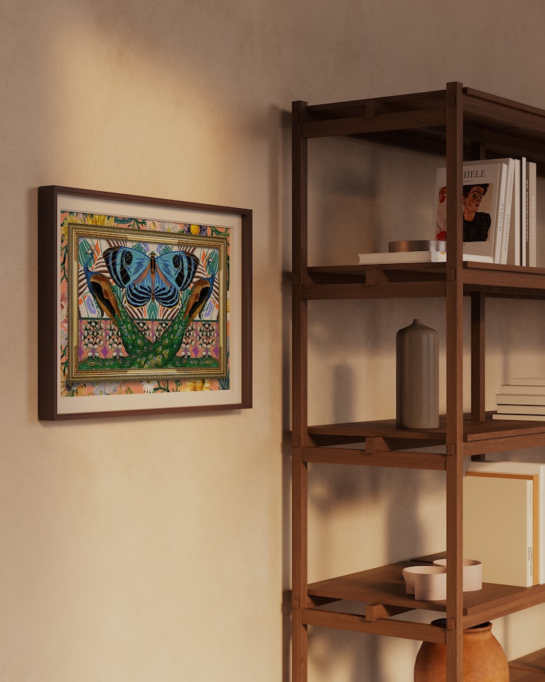May include: A framed print of a colorful butterfly with peacock feathers on a patterned background. The frame is brown wood and the print is surrounded by a white mat.