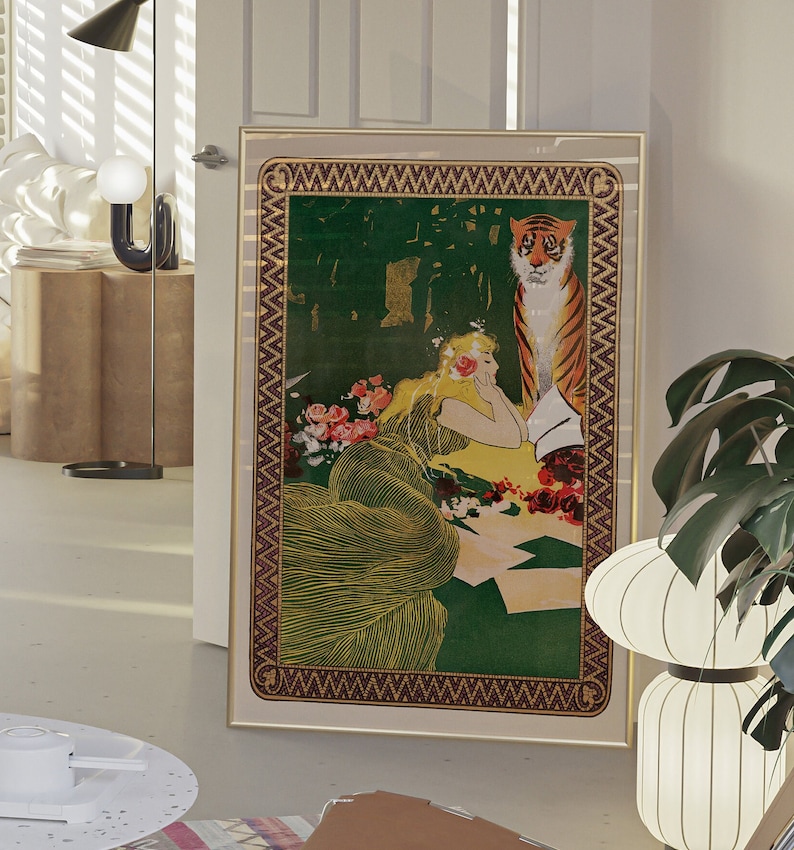 May include: A framed vintage illustration of a woman in a green dress with a tiger behind her. The woman is lying down and looking at the tiger. The illustration is set against a green background with flowers.
