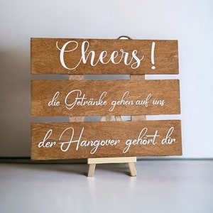 Hochzeitsdeko Schild, Cheers die Getränke gehen auf uns der Hangover gehört dir. Party deko Bild 5