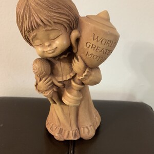 Rare engraved wooden worlds greatest mom figurine