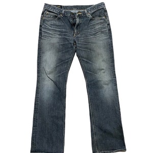 Jeans vintage Lee Riders Japan desgastado, fabricado pela Lee Union