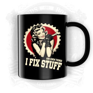 May include: Black ceramic mug featuring a retro illustration of a woman holding a wrench, set against a gear-shaped background. The mug has the text "I FIX STUFF AND KNOW THINGS" in white. The mug has a black handle.