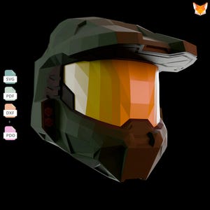May include: A low-poly style helmet featuring a dark olive green exterior and a prominent, faceted golden-orange visor. The design includes file format icons labeled SVG, PDF, DXF, and PDO displayed vertically on the left side of the helmet.