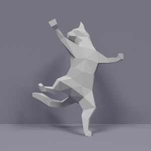 May include: A white, geometric, origami-style cat sculpture with a playful pose. The cat is standing on its hind legs with its front paws raised in the air.