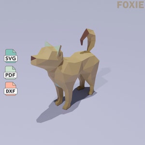 May include: A low-poly 3D model of a brown dog with a light blue collar. The model is designed to be printed and assembled. The image includes the words "FOXIE", "SVG", "PDF", and "DXF".