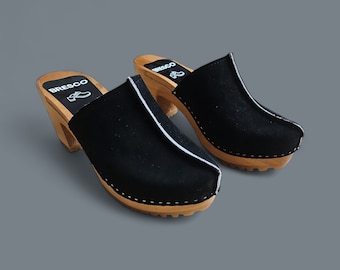 High heel Swedish wooden clogs of natural black suede leather with closed toe uppers on high heels for women