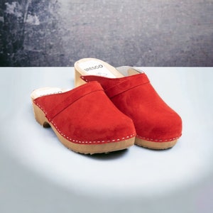 Swedish wooden clogs made of natural suede leather in red and wooden sole, with decorative stripe, available sizes 35-47 EU from BrescoClogs