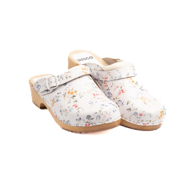 Swedish white wooden clogs with buckle from flowers white real leather and alder wood for women and men with soft foam of upper from Bresco