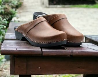 Women Swedish wooden clogs made of natural leather in brown and wooden sole with decorative stripe, available sizes 35-42 EU