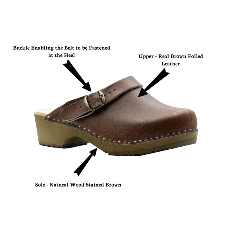 May include: Brown leather clog with a buckle strap and wooden sole. The upper is real brown foiled leather. The sole is natural wood stained brown. The buckle enables the belt to be fastened at the heel.