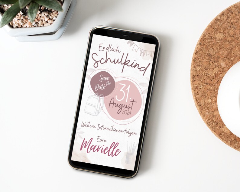 May include: A pink and white smartphone screen with the text "Endlich Schulkind" and "Save the Date" with a date of August 31, 2024. The text "Weitere Informationen folgen" and "Eure Marielle" is also on the screen.