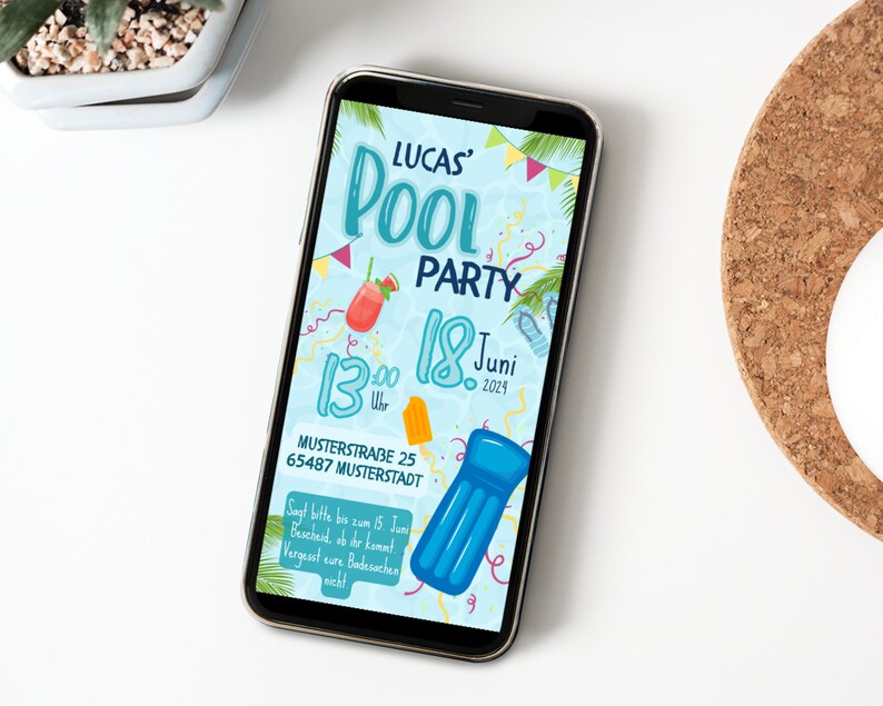 May include: A smartphone displaying a colorful invitation to a pool party. The invitation features the text "Lucas' Pool Party" and the date "18. Juni 2023". The invitation also includes a blue inflatable pool float, a red drink with a slice of watermelon, and a yellow popsicle.