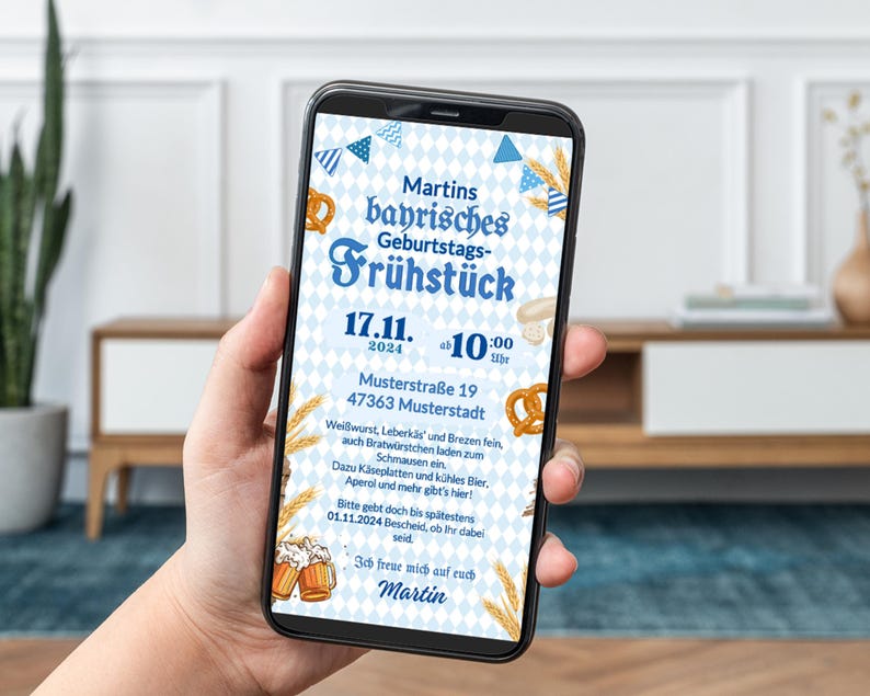 May include: A blue and white smartphone screen displaying a digital invitation to a Bavarian birthday breakfast. The invitation features a pretzel, beer steins, and wheat stalks. The text reads "Martins bayrisches Geburtstags-Fr&uuml;hst&uuml;ck 17.11. 2024 10:00 Uhr Musterstra&szlig;e 19 47363 Musterstadt".