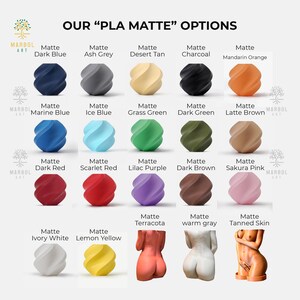 May include: A chart showing 18 different color options for PLA matte filament. The colors are arranged in three rows of six colors each. The colors include dark blue, ash grey, desert tan, charcoal, mandarin orange, marine blue, ice blue, grass green, dark green, latte brown, dark red, scarlet red, lilac purple, dark brown, sakura pink, ivory white, lemon yellow, terracotta, warm gray, and tanned skin.
