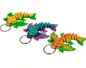 Llavero articulado de dragón Wyvern con diseño de bebé dragón, ideal como regalo de Pascua.