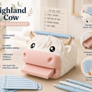May include: A white and pink Highland cow desk organizer featuring a slot for sticky notes, a pen rest between the horns, and a storage tray in the back. The organizer includes three blue reusable stencils and holds a to-do list note.