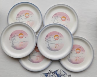 Ensemble de six assiettes plates vintages Moulin des Loups modèle "Coucher de soleil".