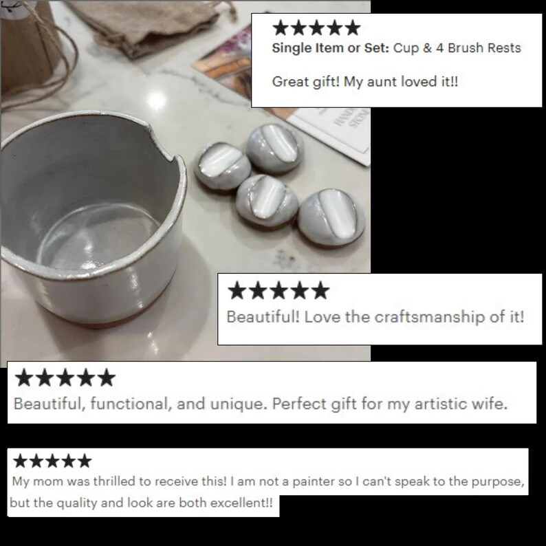 May include: A ceramic cup and four brush rests. The cup is white with a slightly textured surface and a rounded shape. The brush rests are oval-shaped, with a white and gray color scheme. The image includes customer reviews.