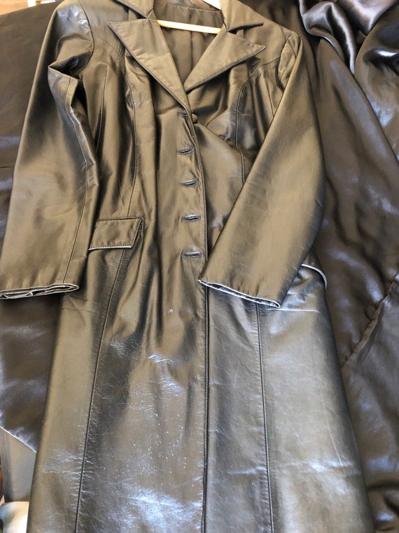 Black leather “Barbarella” trench coat/coat-dress
