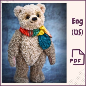 May include: A plush teddy bear with a light brown fur, wearing a colorful scarf with red, yellow, green, and blue stripes. The bear has a black nose and brown eyes.
