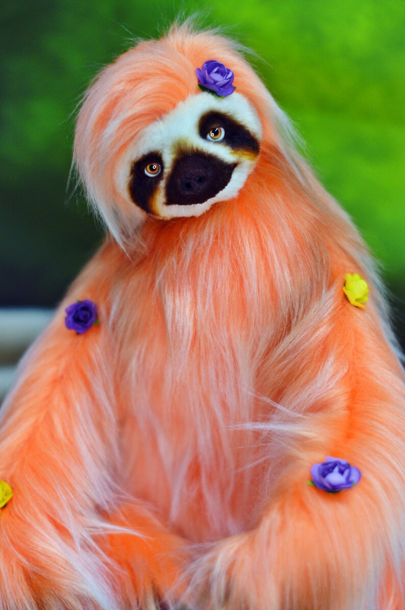 Finished sloth doll from printable sewing pattern – held in hand