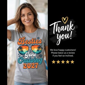 May include: A gray t-shirt with the text "Besties Gone Cruising 2027" in orange and teal. The design includes sunglasses with a sunset and palm trees. The image also includes the text "Thank you!" and a customer review request.