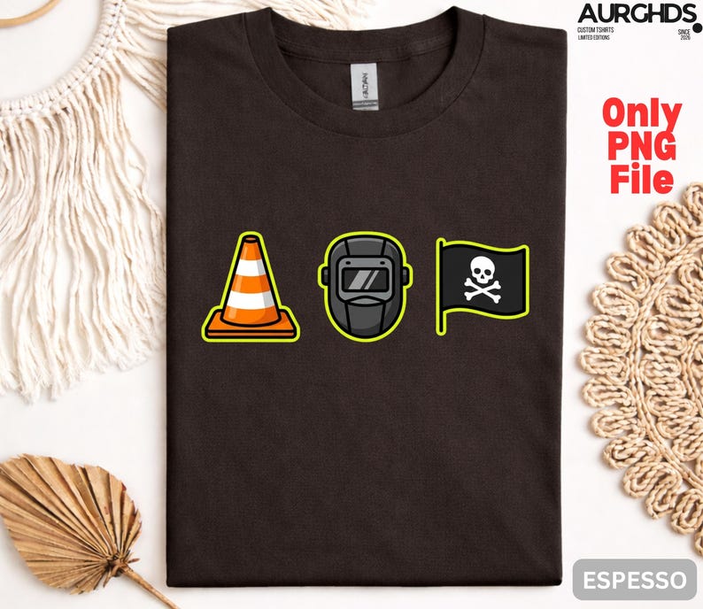 May include: Espresso-colored t-shirt featuring three cartoon graphics: an orange and white traffic cone, a welding mask, and a black flag with a skull and crossbones. The text "Only PNG File" is visible.