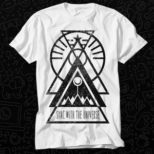 May include: White t-shirt with a black and white geometric design featuring a triangle, circle, and star. The design has a distressed, vintage look. The text "SYNC WITH THE UNIVERSE" is printed below the design.