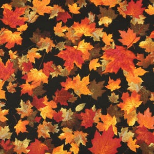 May include: A fabric pattern with a repeating design of autumn leaves in shades of red, orange, and yellow against a black background. The leaves are of varying sizes and are scattered across the surface.