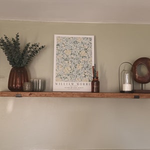 Rustic shelf made from Reclaimed scaffold board. Brackets included .