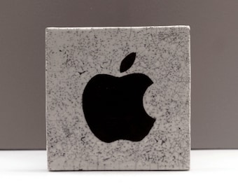 Icon 2, Apple logo, handmade ceramic square, raku firing.