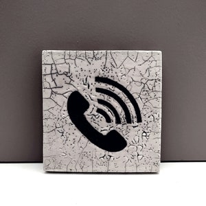 Icon 1, phone call symbol, handmade ceramic square, raku firing. image 1