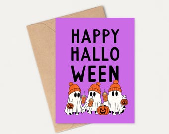 May include: A Halloween greeting card with the words "HAPPY HALLOWEEN" in black on a purple background. Three cartoon ghosts wearing orange hats and holding pumpkin-shaped lanterns and drinks are featured below the text. The card is on a brown envelope.
