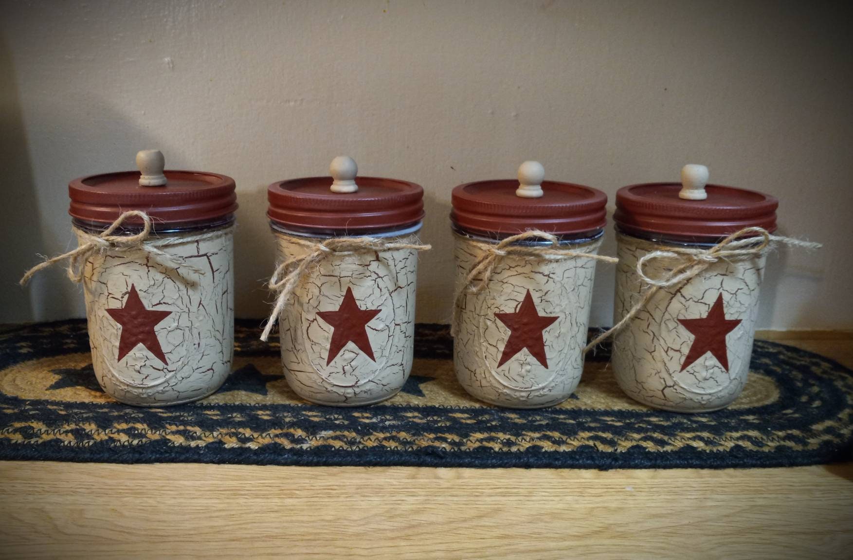 recycled food jars turned storage jars with glass knob tops