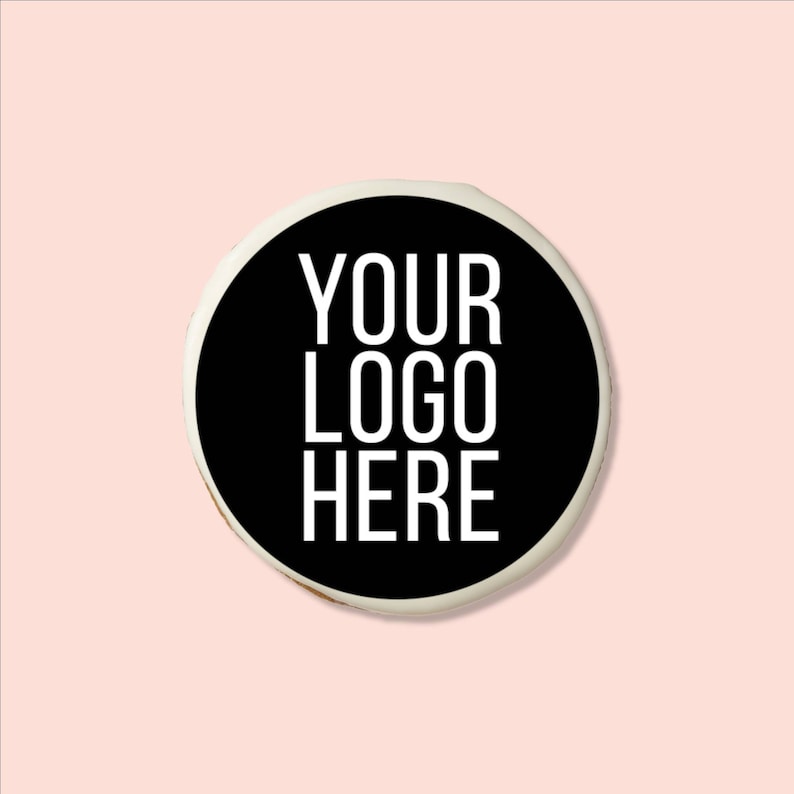 May include: A white round cookie with black icing and the text "YOUR LOGO HERE" in white.
