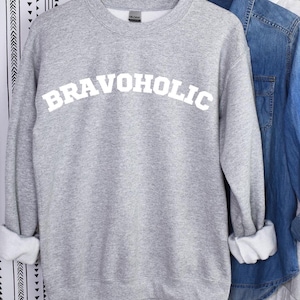 BRAVOHOLIC humor sweatshirt, Funny BRAVO Shirt, MOM Bravo, Unisex Heavy Blend Crewneck Sweatshirt