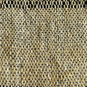 May include: Close-up of a woven textile with a textured pattern. The fabric is primarily beige with horizontal bands of black. The weave creates a grid-like design, showcasing the natural fibers and craftsmanship.