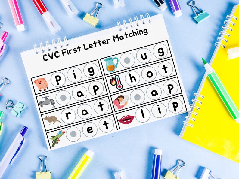 May include: A printable CVC first letter matching worksheet with images of a pig, a faucet, a rat, a plane, a hot iron, a sleeping person, a pair of lips, and letters. The worksheet is on a blue background with school supplies.