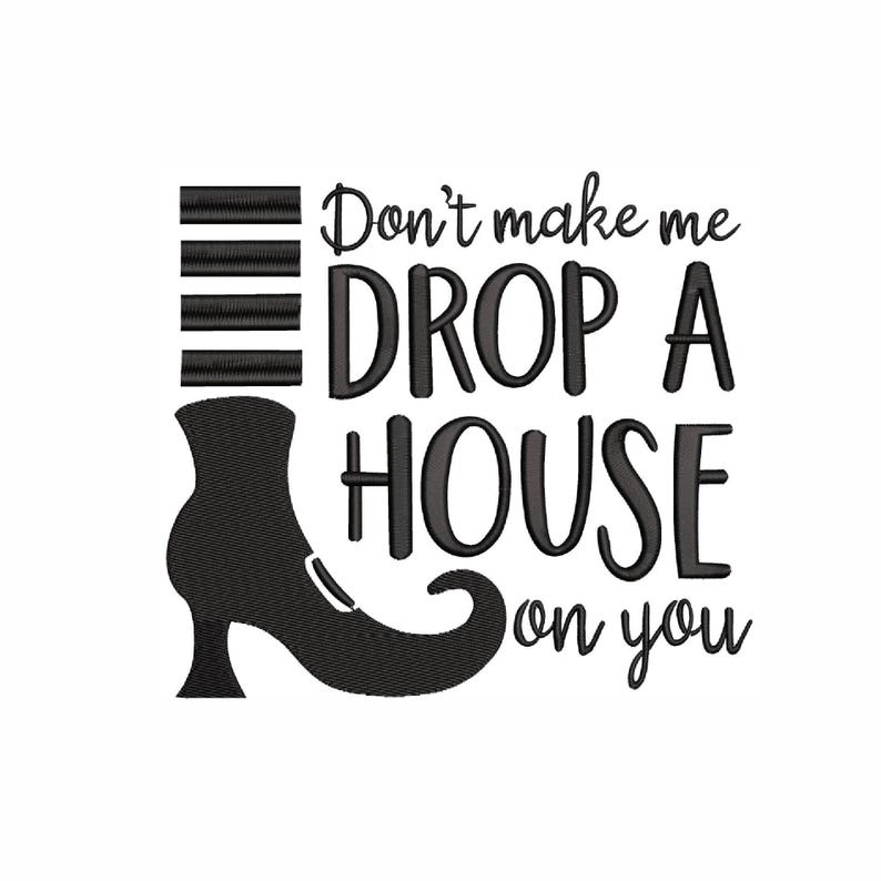 May include: Black embroidered design with the text "Don't make me DROP A HOUSE on you" and a witch's boot. The design includes horizontal lines and a witch's boot silhouette, perfect for Halloween decor.