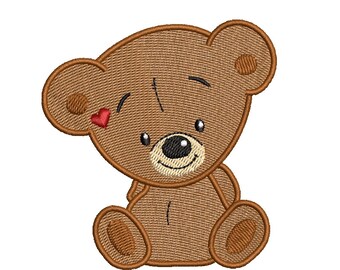 May include: A brown teddy bear with a red heart on its forehead is sitting with its legs crossed. The bear has a black nose and black eyes.